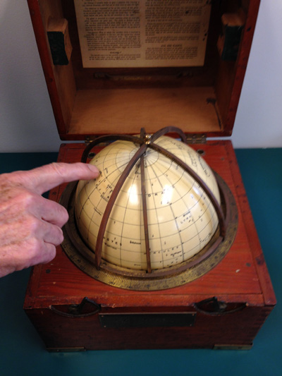 Photo of What IS that Wooden Box with a Globe Inside?