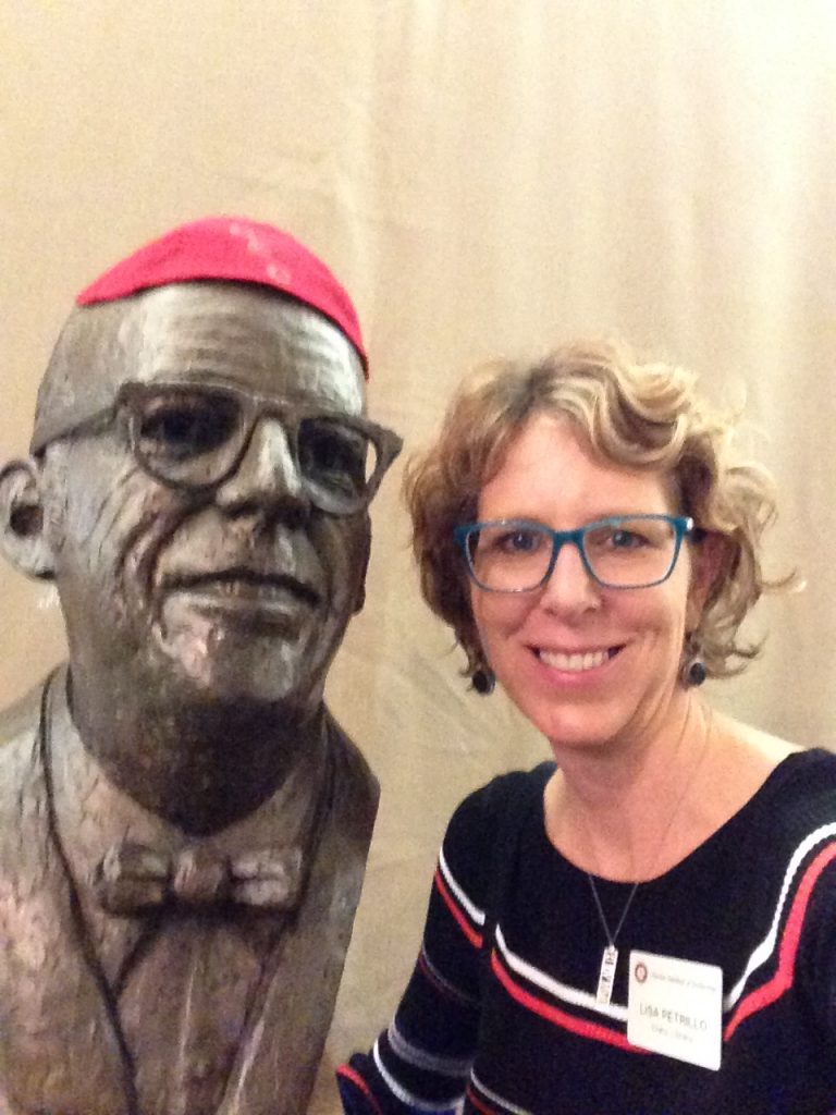 Lisa Petrillo takes a selfie with Dr. Keuper's bust.