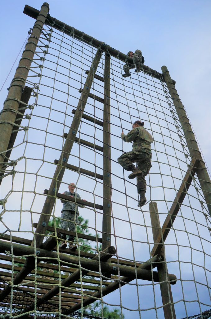 Florida Tech ROTC members climb rope net