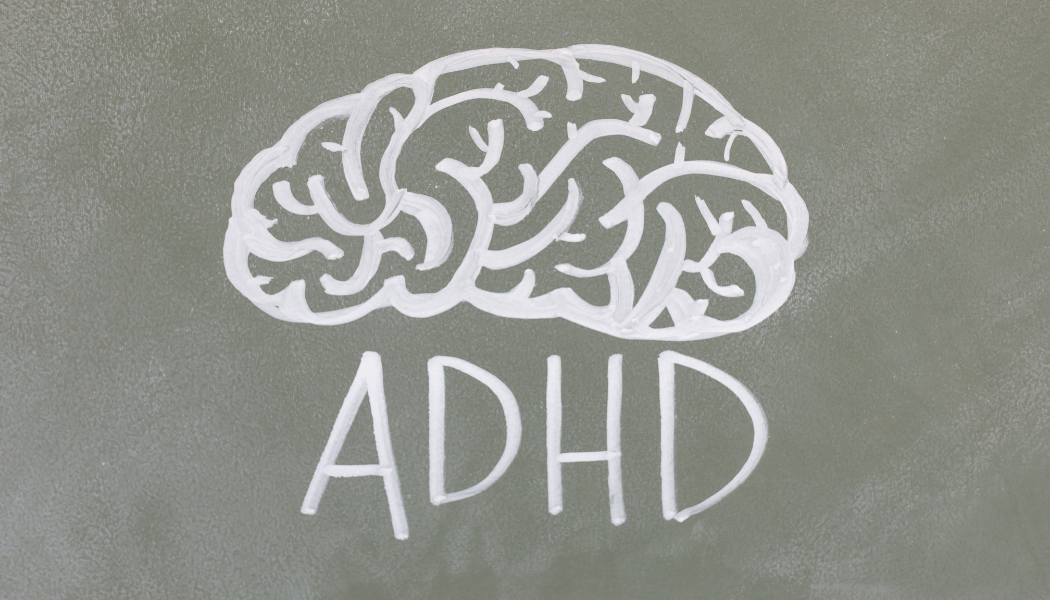 Stock image of brain and "ADHD" written in chalk