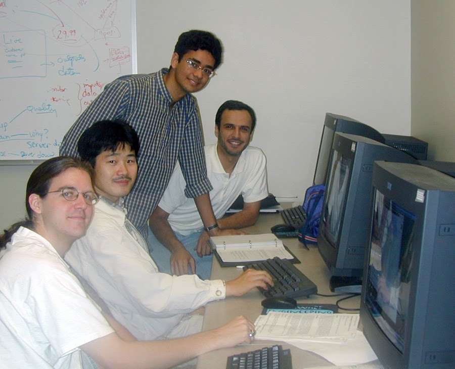 A group of students in a computer lab around 2001.