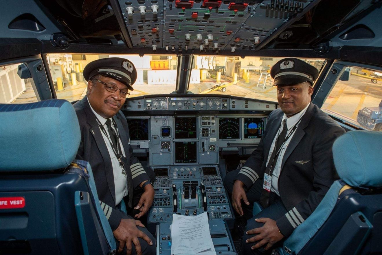 Dennis Bourne ’79 A.S., ’81, and Brandon Bourne ’13 made history as the first Black father-son duo to fly together with American Airlines.