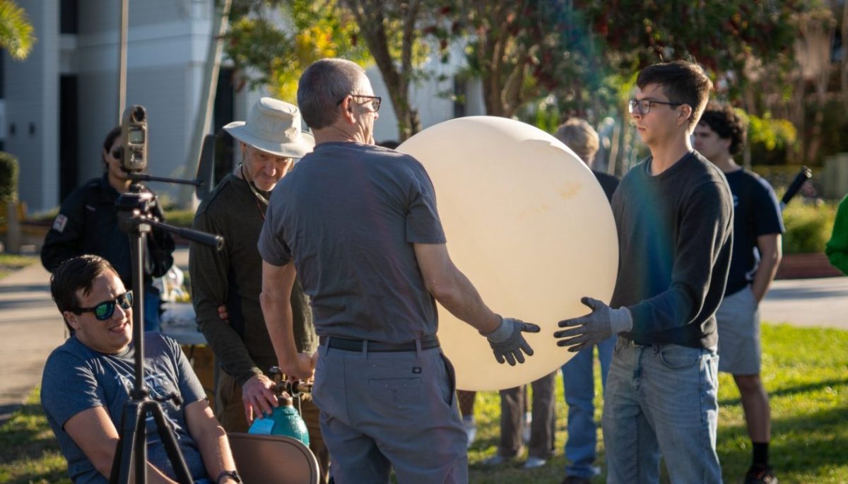 Meteorology Students, Faculty Deploy Weather Balloon from Crawford Green